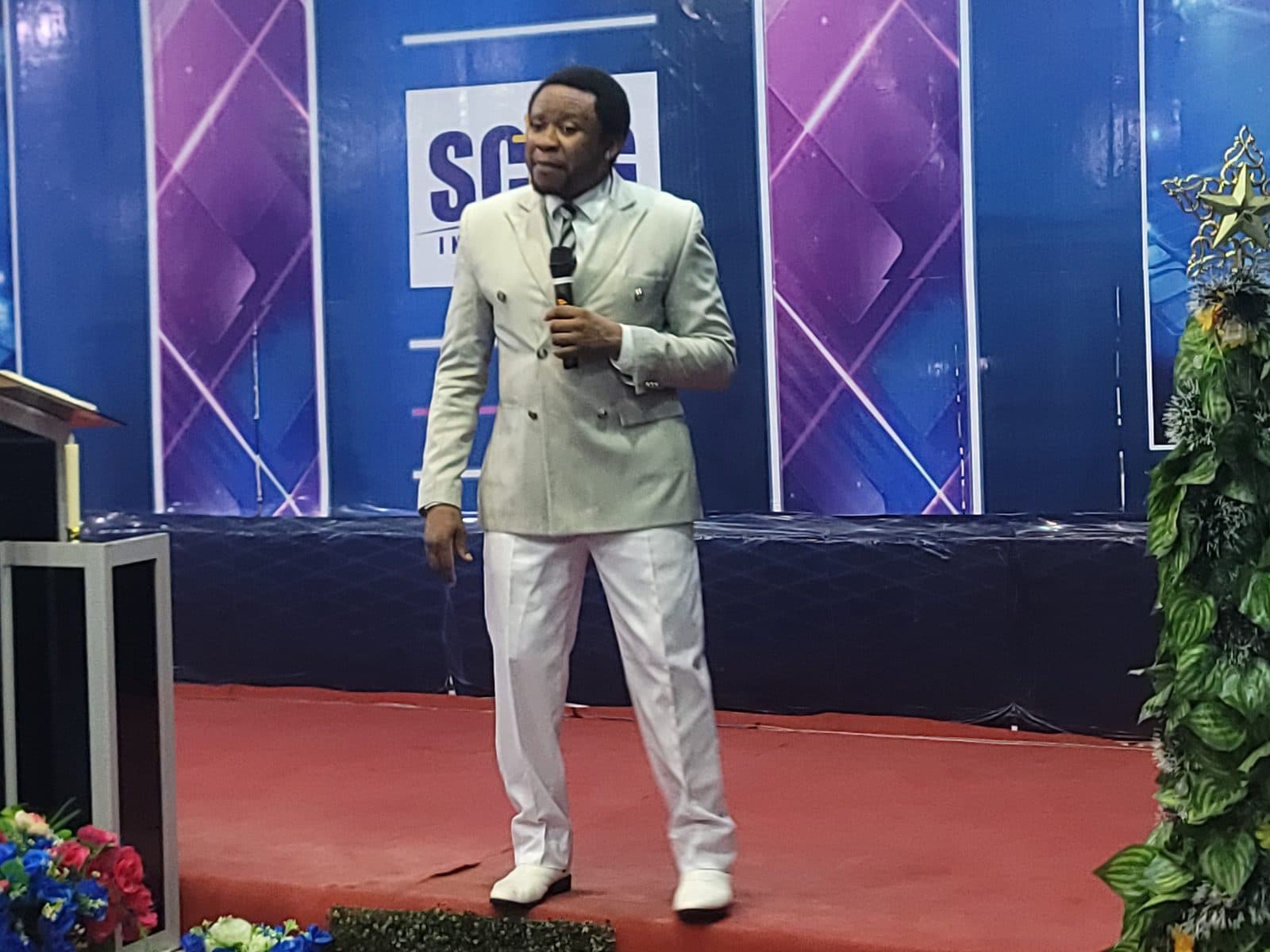 Apostle A. E. Stanley preaching
